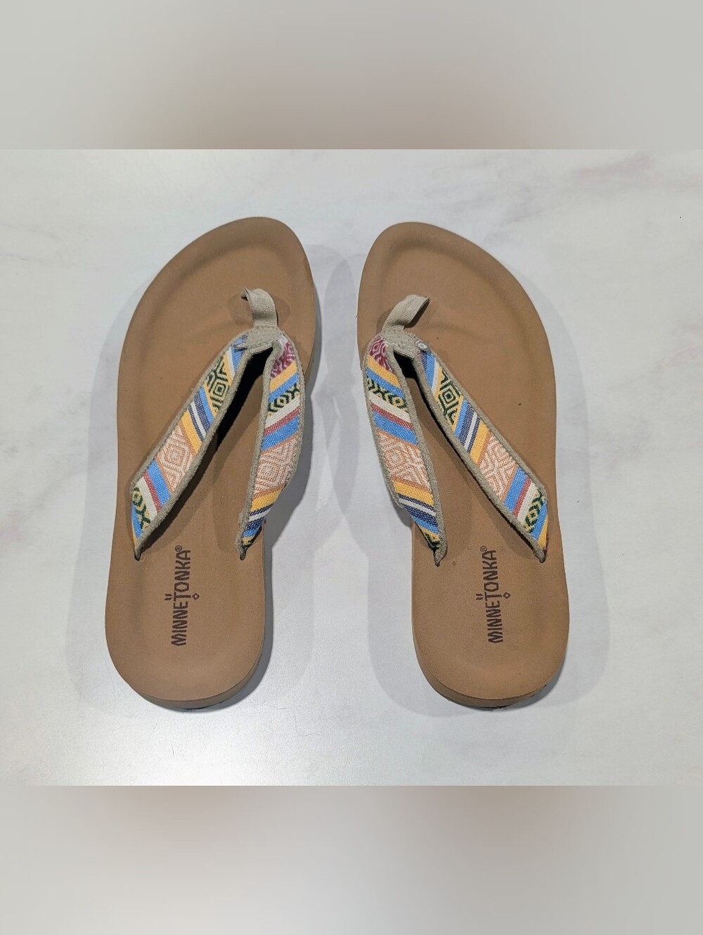 Minnetonka Tan Footbed Flip Flops with Multicolor Patterned Straps